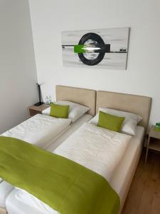 Postel nebo postele na pokoji v ubytování Hotel Garni Ilys Inn