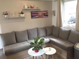 Posedenie v ubytovaní Bungalow convivial à Saint-Brevin-les-Pins avec piscine - 32 m²