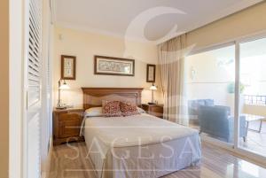 Postel nebo postele na pokoji v ubytování Hacienda Playa