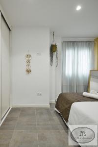 Postel nebo postele na pokoji v ubytování Apartamento Playa Recreo Little Apartments
