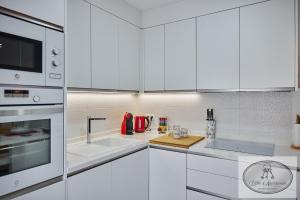 Kuchyň nebo kuchyňský kout v ubytování Apartamento Playa Recreo Little Apartments