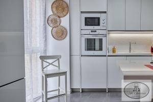 Kuchyň nebo kuchyňský kout v ubytování Apartamento Playa Recreo Little Apartments