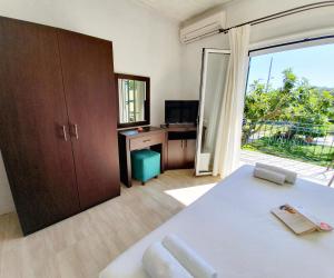 Posteľ alebo postele v izbe v ubytovaní Giovanni Group Apartments