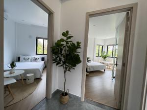Ein Bett oder Betten in einem Zimmer der Unterkunft ANH’s HOUSE