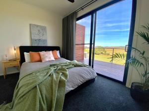 מיטה או מיטות בחדר ב-Wamoon Retreat - Luxe House