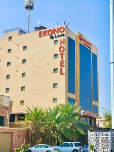 a building with a sign on the side of it at EKONO by Leva Jeddah Airport Hotel in Jeddah