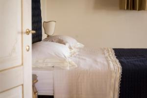 Een bed of bedden in een kamer bij Vallibona Pool's Depandance