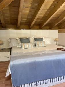 Postel nebo postele na pokoji v ubytování Hotel Nagusi