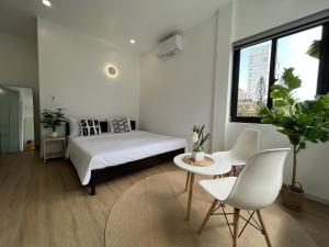 Ein Bett oder Betten in einem Zimmer der Unterkunft ANH’s HOUSE