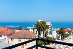 a view of the ocean from a balcony at Casa on Bantry by Totalstay in Cape Town