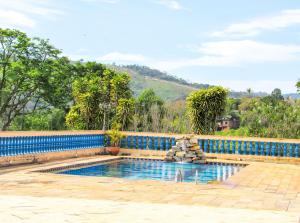 Bazén v ubytování Casa de campo c piscina e lazer em Mairiporã nebo v jeho okolí