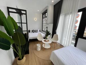 Ein Bett oder Betten in einem Zimmer der Unterkunft ANH’s HOUSE