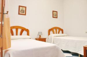 Postel nebo postele na pokoji v ubytování Apartamento Centro