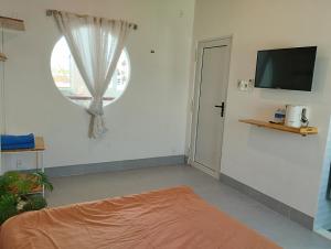 En eller flere senge i et værelse på Nhà bốn chín