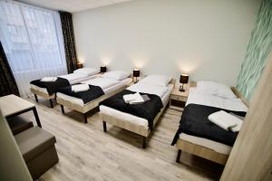 Ένα ή περισσότερα κρεβάτια σε δωμάτιο στο Hostel OPEN GARDEN
