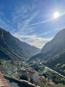 a view of a valley in the mountains at Green Valley House Madeira in Ribeira Brava