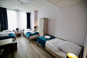 Letto o letti in una camera di Hostel OPEN GARDEN