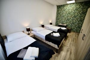 Letto o letti in una camera di Hostel OPEN GARDEN