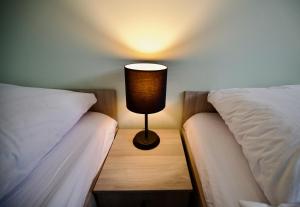 Letto o letti in una camera di Hostel OPEN GARDEN