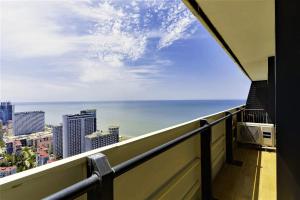 a balcony with a view of the ocean at Orbi City Sea Side & Sea View Apartments in Batumi