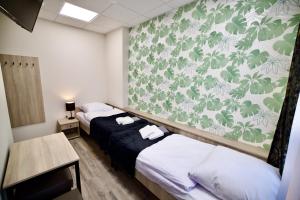 Letto o letti in una camera di Hostel OPEN GARDEN
