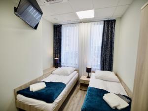 Letto o letti in una camera di Hostel OPEN GARDEN