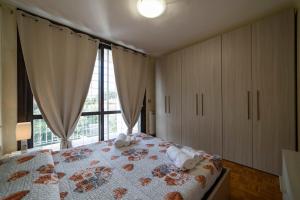 A bed or beds in a room at ISEO CHARME VILLAS