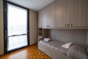 A bed or beds in a room at ISEO CHARME VILLAS