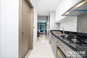 Kuchyň nebo kuchyňský kout v ubytování Sleek & Modern Studio in Business Bay 2