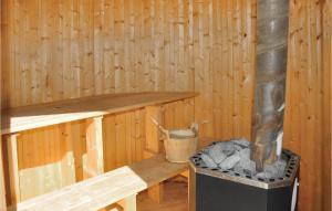 a inside of a wooden cabin with a bucket at Lovely Home In Kil With Wifi in Kil
