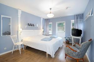 Postel nebo postele na pokoji v ubytování Hotell Aina