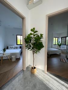 Ein Bett oder Betten in einem Zimmer der Unterkunft ANH’s HOUSE