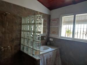Vonios kambarys apgyvendinimo įstaigoje Casa el Rincón