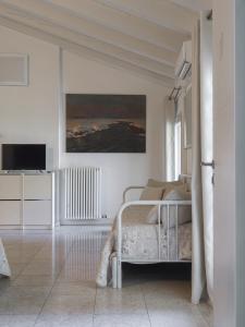 Televízia a/alebo spoločenská miestnosť v ubytovaní Academia Resort