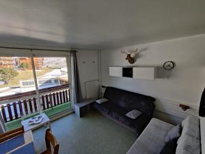Posedenie v ubytovaní Studio SuperDévoluy dans batiment Bois D'Aurouze au pied des pistes