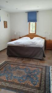 Postel nebo postele na pokoji v ubytování Linda Gård apartment