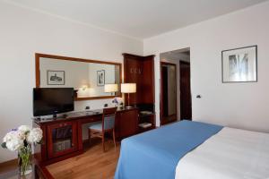 Voodi või voodid majutusasutuse Starhotels Excelsior toas