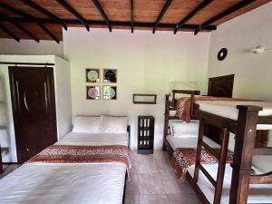 Casa Hotel Camino Real客房内的一张或多张床位