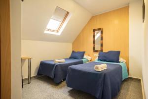 Postel nebo postele na pokoji v ubytování Hostal Mitre Paterna + 28 fotografií