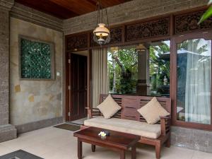 Posezení v ubytování De Munut Balinese Resort