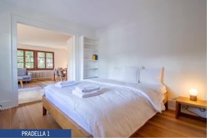 Postel nebo postele na pokoji v ubytování Chalet Pradella by Arosa Holiday