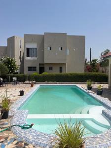 The swimming pool at or close to The White House Tujereng