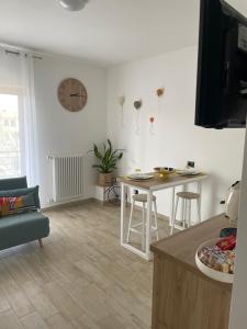 TV a/nebo společenská místnost v ubytování B&B Archimede
