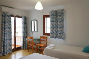 A bed or beds in a room at Apartamentos Vistalmar Mallorca