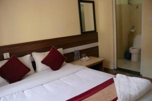 Postelja oz. postelje v sobi nastanitve HOTEL LUMA INN