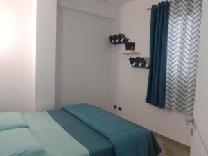 Postel nebo postele na pokoji v ubytování Villa Cecilia
