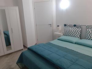 Postel nebo postele na pokoji v ubytování Villa Cecilia