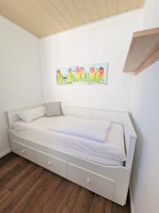 Postel nebo postele na pokoji v ubytování Ferienpark E09-005 Ferienpark