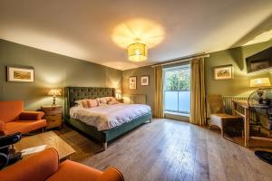 Tempat tidur dalam kamar di The Globe Inn