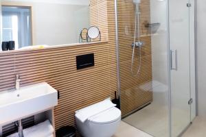 Um banheiro em Hotel Vinice Hnanice